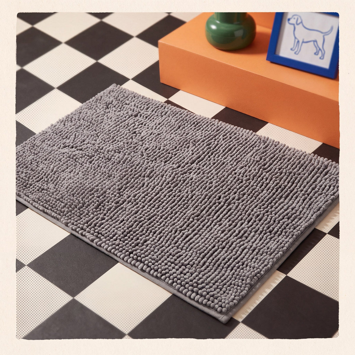 Grey chenille dog door mat positioned for wet and muddy paws