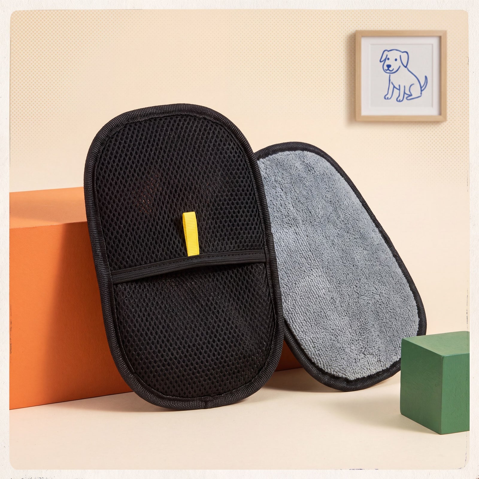 The Petting Glove — dual-sided grooming mitt hero, black mesh and grey microfiber sides with yellow tab